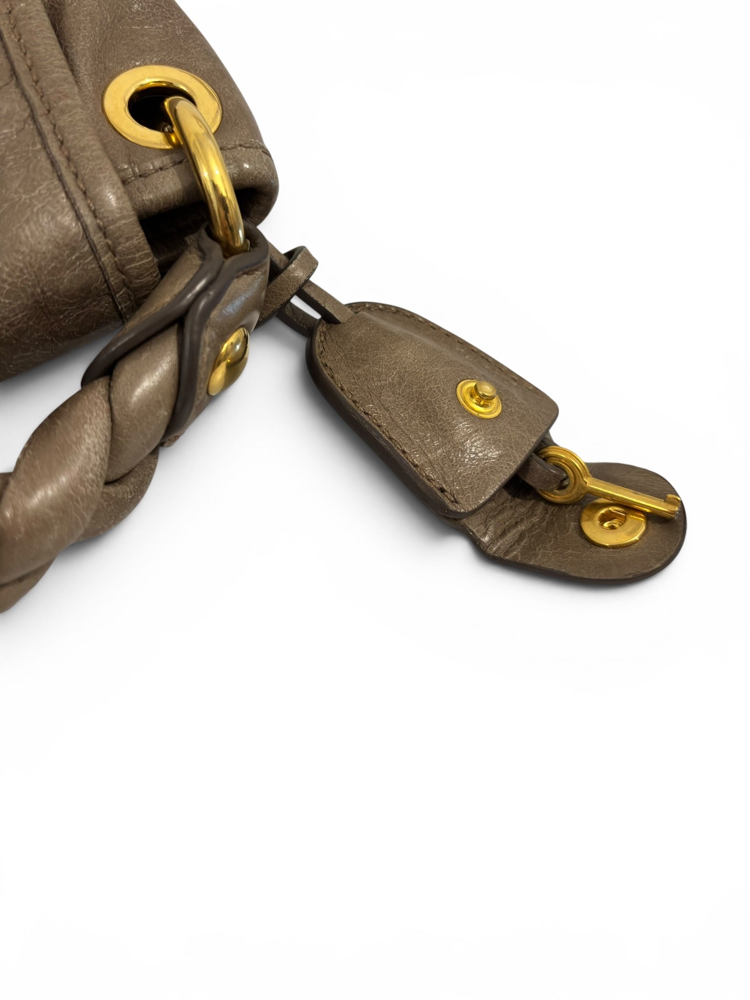 Miu Miu Vitello Lux Matelassé Coffer Hobo Taupe
Leather Gold Hardware Shoulder Bag