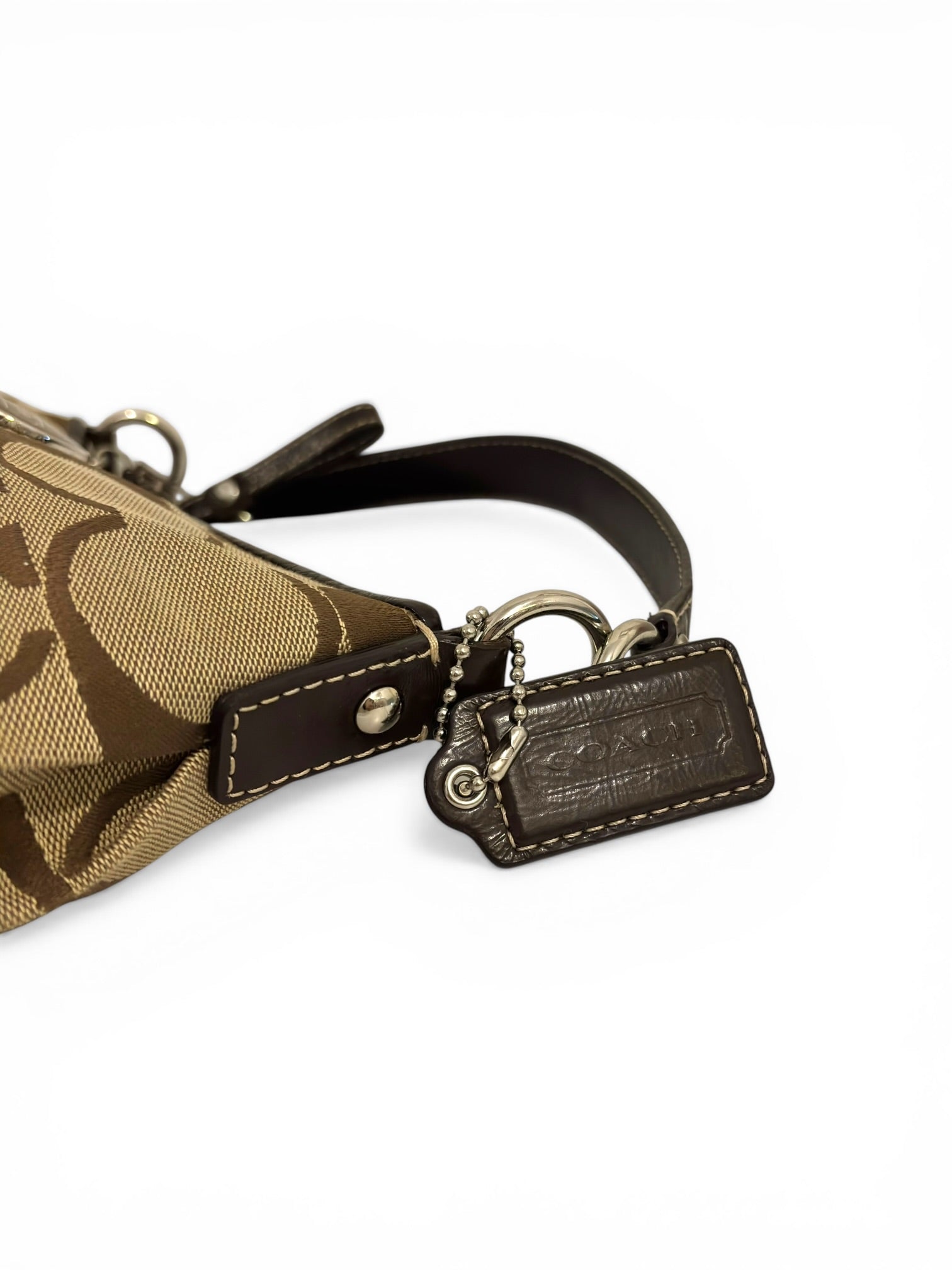 Coach Brown Signature Stripe Demi Baguette
Canvas & Patent Leather Shoulder Bag