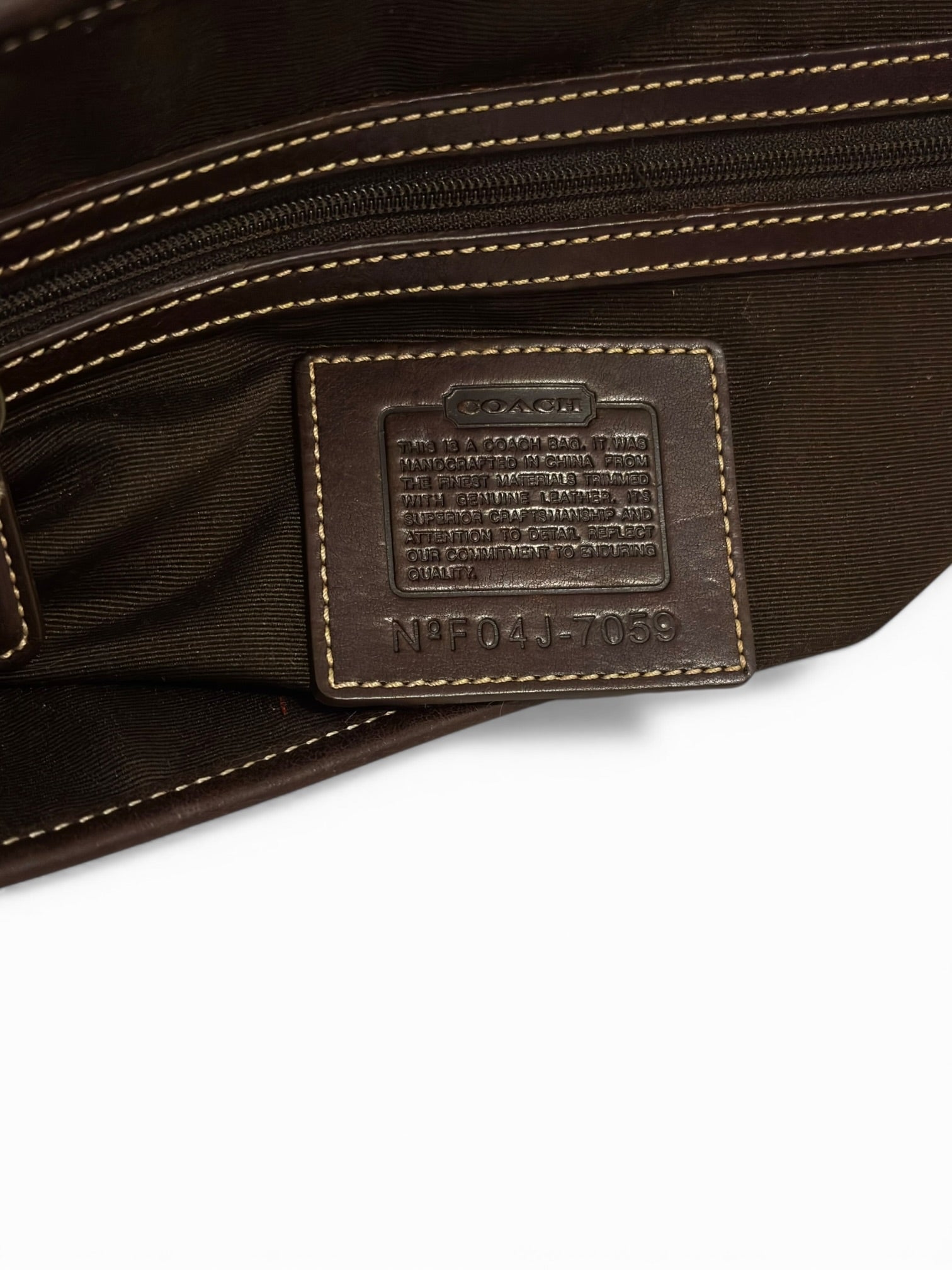 Coach Signature Soho Brown Canvas & Suede
Buckle Handbag F04J-7059