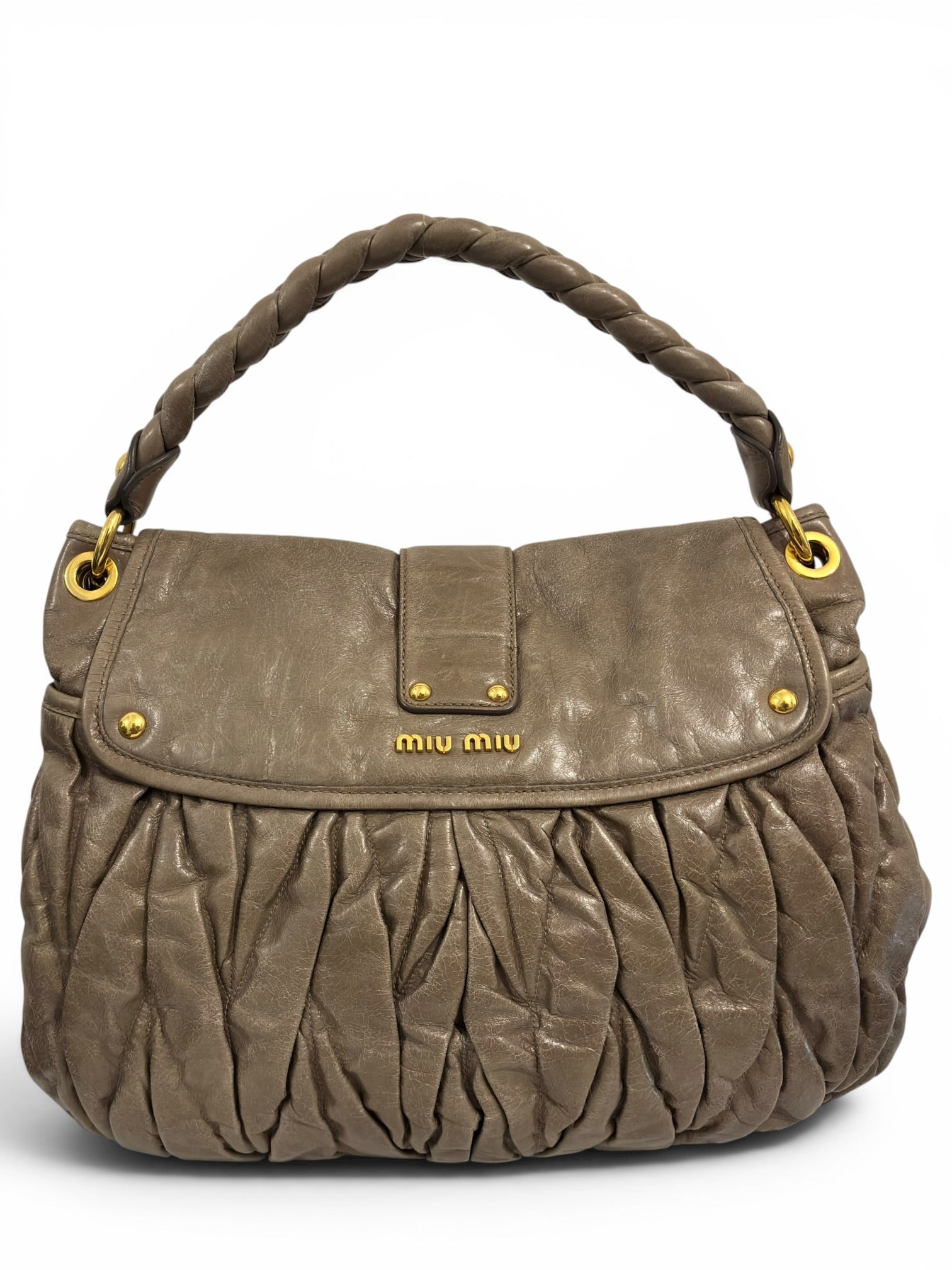 Miu Miu Vitello Lux Matelassé Coffer Hobo Taupe
Leather Gold Hardware Shoulder Bag